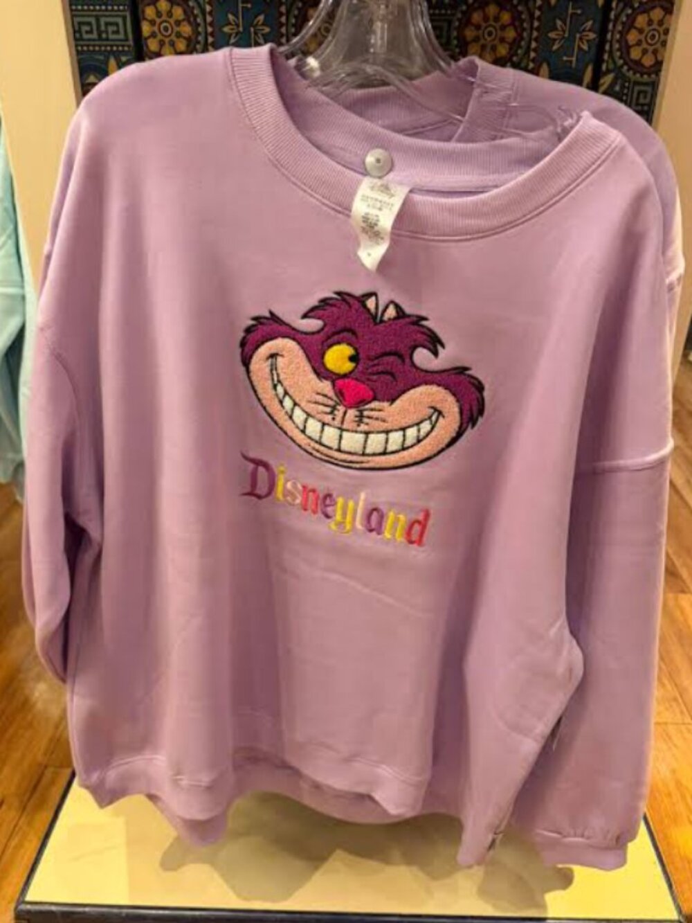 Disneyland Cheshire Cat Purple Crewneck Embroidered Sweatshirt